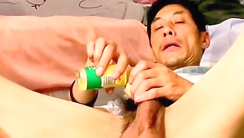 Sexy young girl with a dildo fucks herself